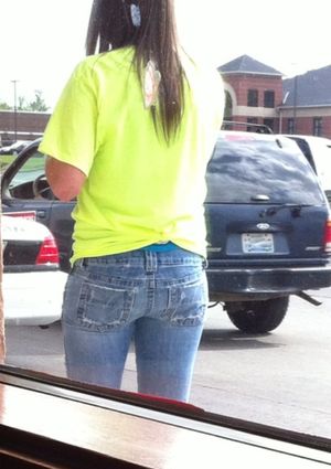 Nothing better to take your mind off a nice meal than a great ass walking by.Â  Glad he had his cell nearby to creep her.