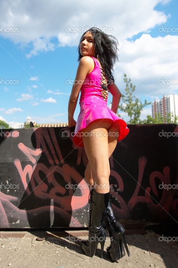 Girl in latex dress. Upskirt.