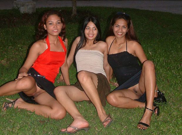 Three lesbian Asian having an outdoor party