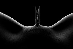 clothespin holds pussy lips