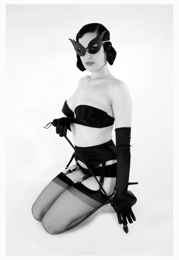 Masked brunette