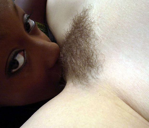 Lovely lesbian brunette in a hot interracial pussy photo