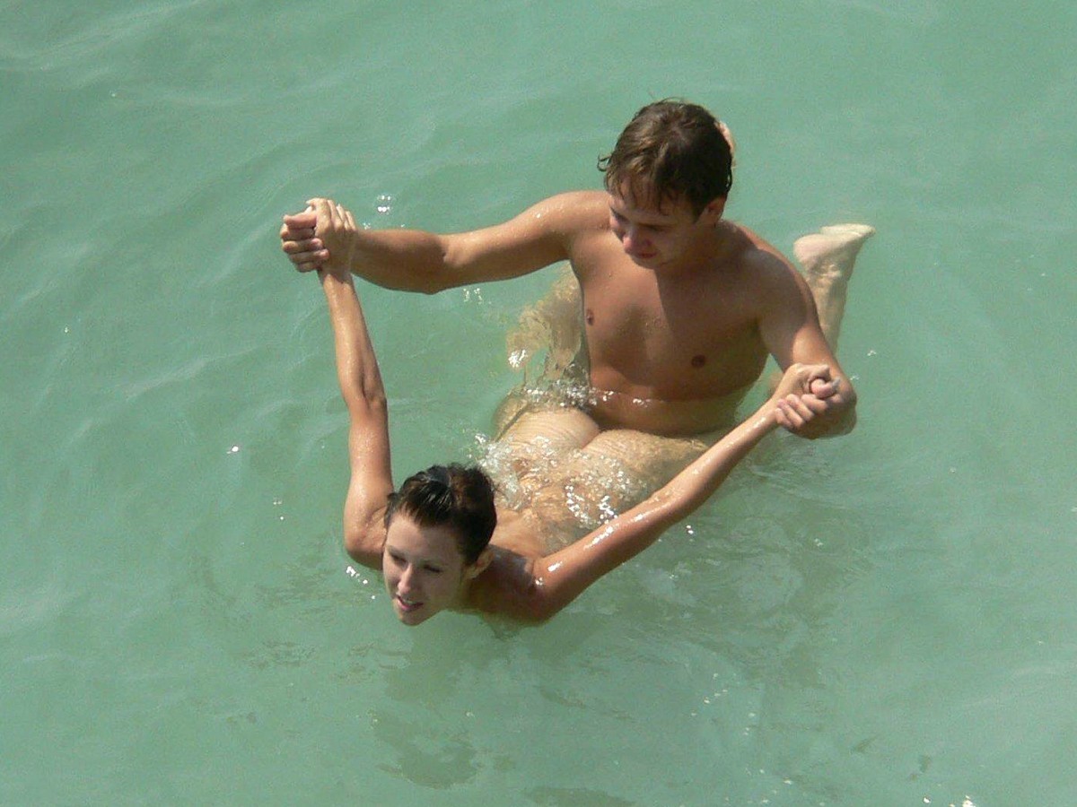 Looks like their have good time in the water together.