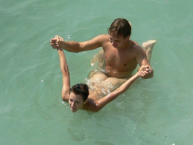 Looks like their have good time in the water together.