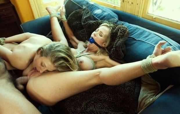 Hot bisexual blonde in a hot bdsm threesome picture