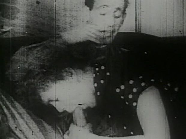 Brunette girl sucking a hard cock in a vintage adult film, I love to watch how people enjoy porn back in the days!
