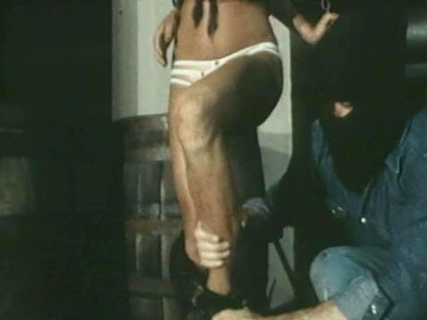 Hot babe with awesome legs and belly getting tied up in a vintage bondage film, perhaps this was late 60's early 70's