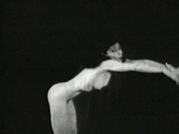 Skinny brunette girl dancing nude in a early 1900's vintage porn