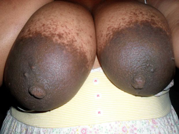 giant tit covering dark areola...for true areola lovers!