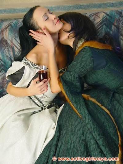 Melisa and Nelli are dressed in elegant renaissance style dresses and they are looking good.