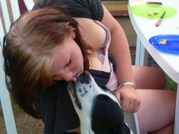 Never thought kissing a dog would create a creepshot opportunity. If you liked this post ... you may enjoy these too!Nice down-shirt creepsh