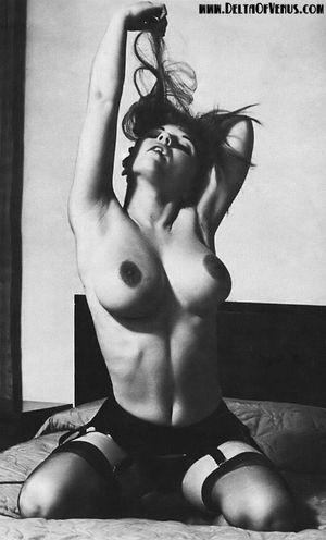 Michelle Angelo 60's 70's black stockings and garters natural breasts