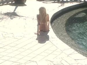 The next door cute blonde gets caught by neighbor sunbathing in the nude
