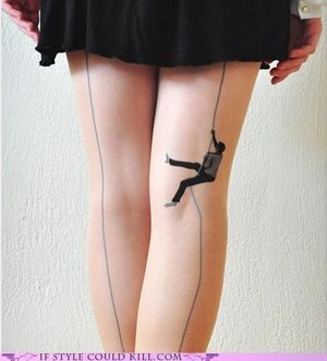 scaling the seam in her stockings.