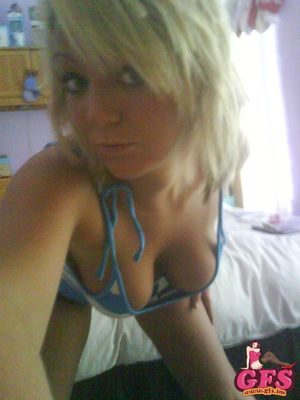 Sexy blonde GF with huge boobies taking a self shot