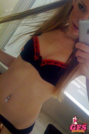 Skinny teen GF taking a self shot in her sexy black lingerie