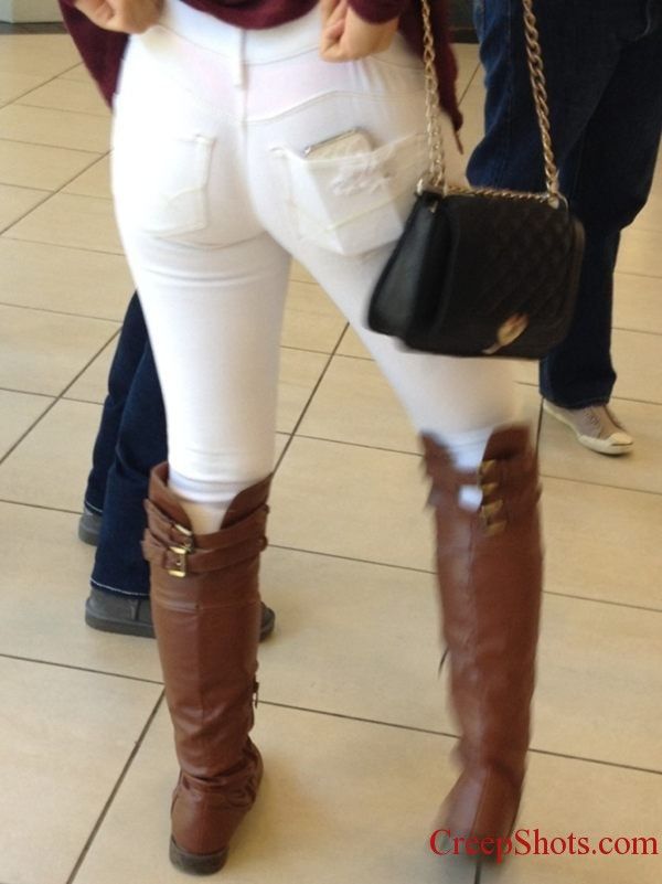 A great ass always looks better in white pants.Â  Now the power wedgie she is performing on herself is call just great timing.Â  Very nice w