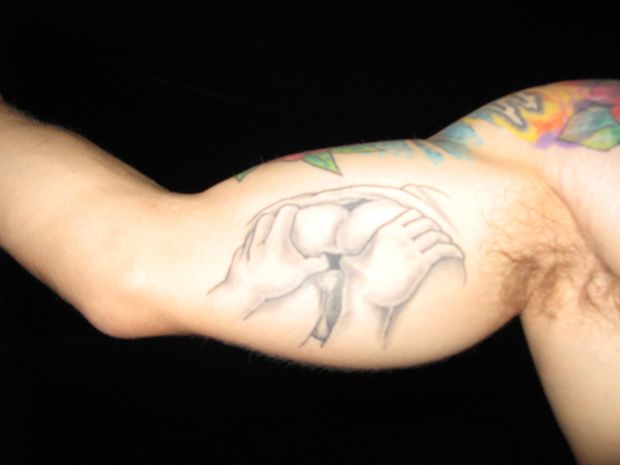 gay tattoo. "Paralyzing the Anus"