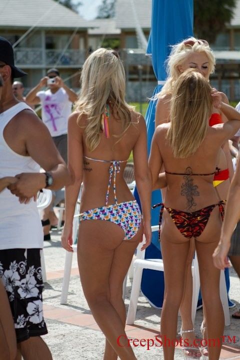 The taller bikini blonde on the left with the glorious ass is an angel.Â  Her ass is a little meatier than her friend on the right.Â  Also,