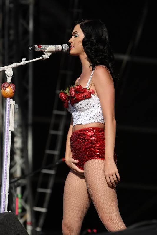 Katy Perry rubbing her pussy with a soft touch while singing to her adoring worshipers.