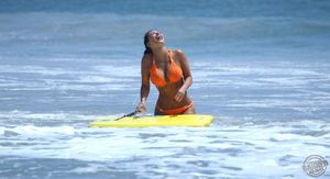 Kim Kardashian shows off her Crotch in a tiny Bikini