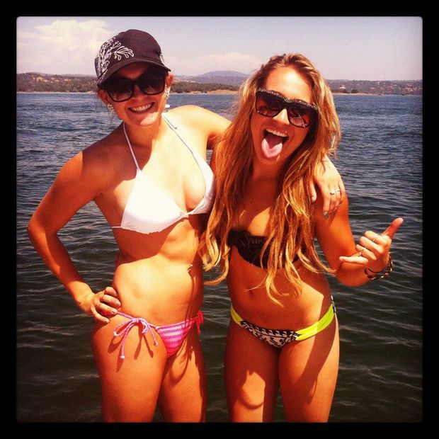 two hot girls with sexy bodies at the lake. big boobs and nice ass