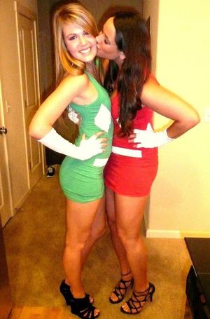 cute girls dress up for party. girl on the left has the most perfect ass in the world, long sexy legs, naughty smile with a gorgeous body