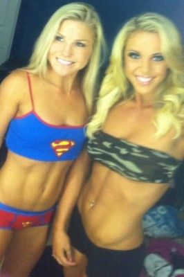two sexy babes in sport bras with hot bodies
