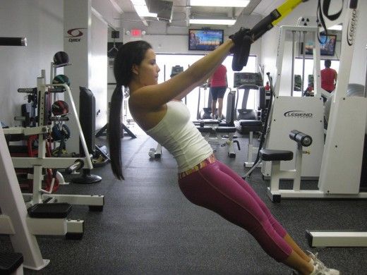 sexy girl working out in leggings with a perfect ass and big tits