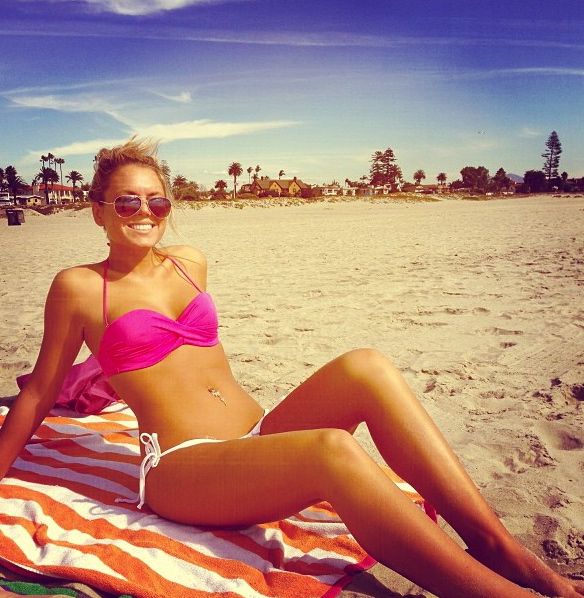 hot girl with sexy legs at the beach