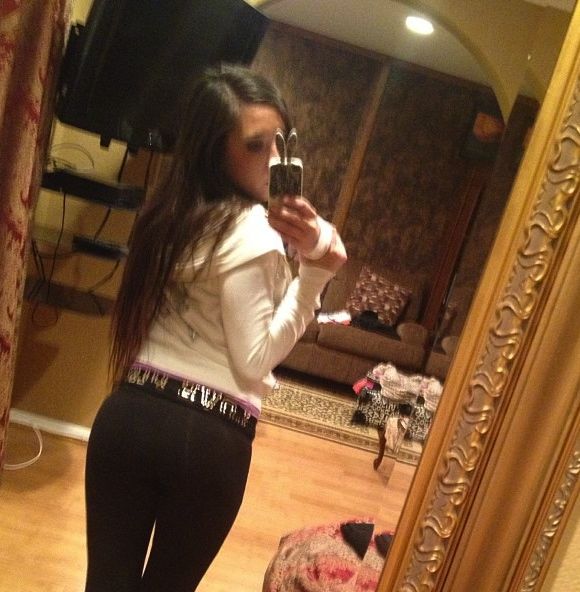 hot girl showing off  her big ass in yoga pants