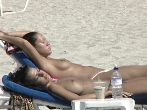 Topless babes at the beach