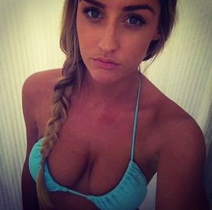 sexy girl in swimsuit showing off her perfect tits