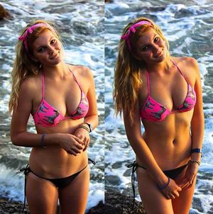 cute girl with an amazing body and big tits in a swimsuit