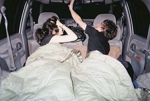 In the car, camping, or some outdoorsy place.