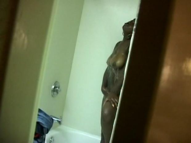 Black girl with big tits taking a shower