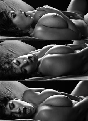 London Andrews rubbing her breasts and box to coming to a orgasm