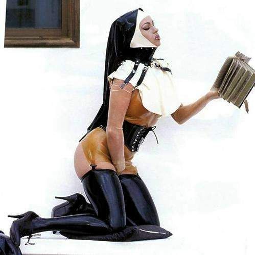 Gorgeous jugs in a amazing bondage uniform pic