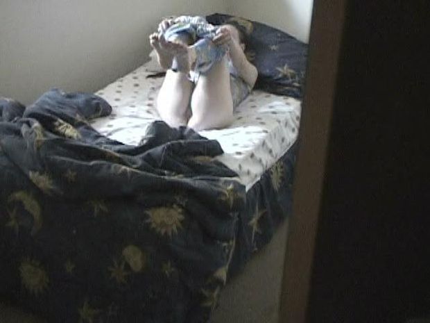 Hot teen undressing in the privacy of her own room gets recorded with a hidden-cam