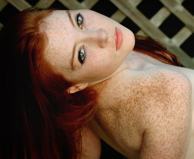 Beautiful Redhead with awesome green eyes
