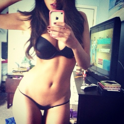 self shot of beautify brunette with a great body