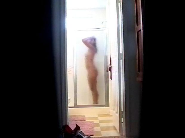 Spying on a hot young babe taking a shower