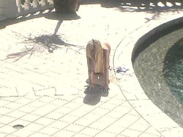 Spying on the blonde next door sunbathing in the nudeAmateur