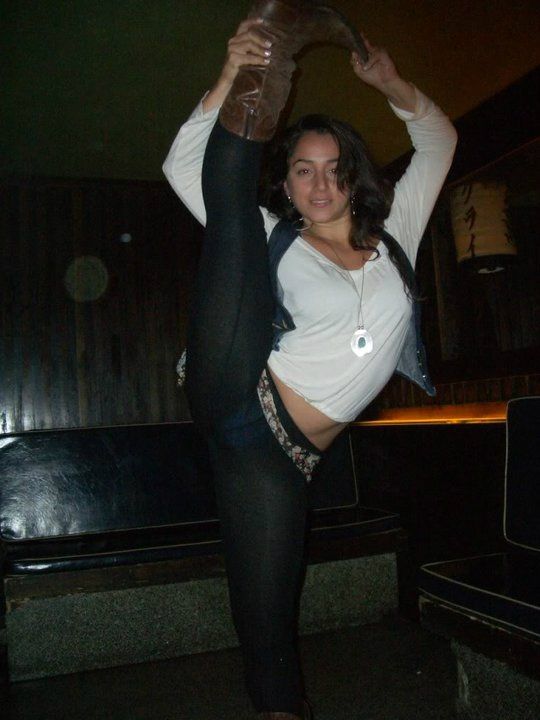 standing splits by young latina teen girl