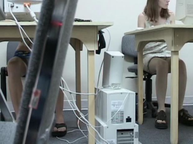 Hidden-Cam set up under the desk at the school computer lab gets nice up-skirt shots of college girls