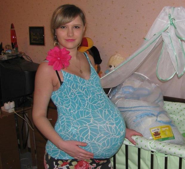 Young pregnant with huge belly