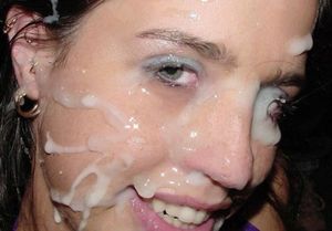 Slut gets cum bath from many men.