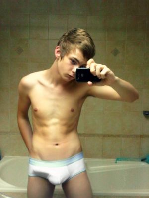 Gorgeous gay teen in a hot thong picture