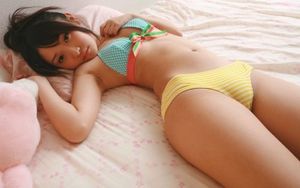 cute asian with her well fitted panties showing cameltoe