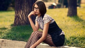 Beautiful chick with stockings and glasses